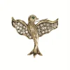 Flight of Paradise Antique Gold & Clear Brooch